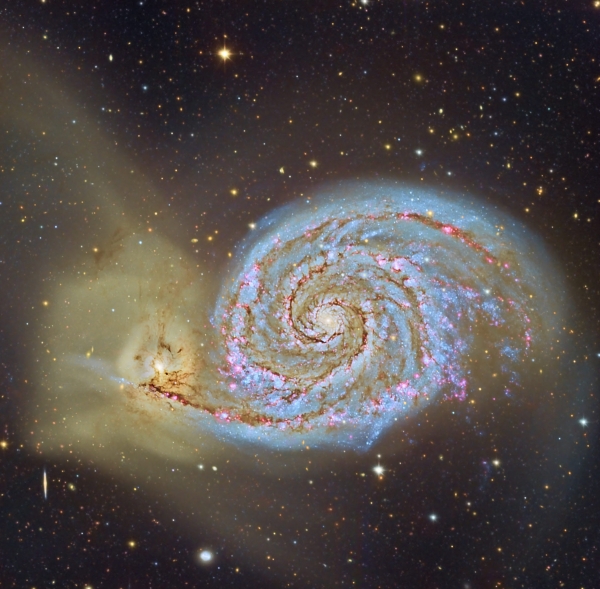 대표적인 충돌 은하인 부자은하, M51의 모습.  M51의 나선팔 끝에 동반 은하인 NGC 5195가 있다. NGC 5195는 M51을 스쳐 지나가면서 서로의 인력으로 팔이 연결되었다. 이처럼 이웃 은하들은 때로 가까운 거리를 스쳐 지나가며 상호작용을 주고받기도 하는데, 그러한 상호작용이 은하의 회전에 직접적인 영향을 미친다는 관측 증거를 이번에 최초로 발견했다. (사진 출처: CAHA, Descubre, DSA, OAUV)